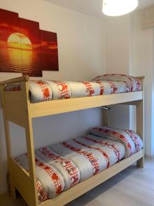 Ένα ή περισσότερα κρεβάτια σε δωμάτιο στο Appartamento Lucky