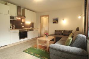 Kuchyň nebo kuchyňský kout v ubytování Apartmenthaus Dornröschen