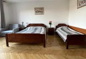 Łóżko lub łóżka w pokoju w obiekcie Hotel Europa
