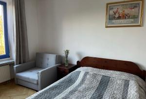Łóżko lub łóżka w pokoju w obiekcie Hotel Europa