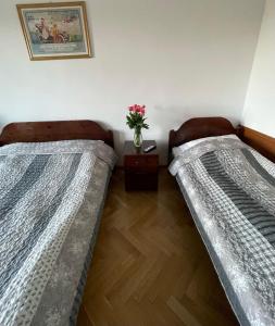 Łóżko lub łóżka w pokoju w obiekcie Hotel Europa