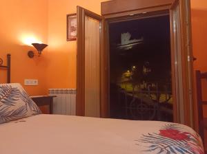 Postel nebo postele na pokoji v ubytování El Balcon de Peñafiel