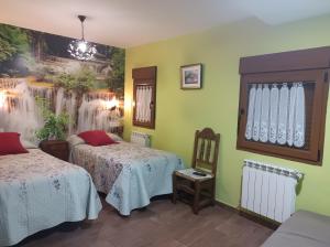 Кровать или кровати в номере El Balcon de Peñafiel