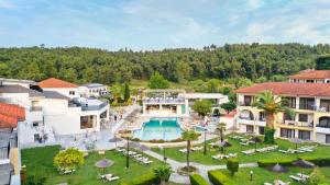 an aerial view of a resort with a swimming pool at Chrousso Village in Paliouri