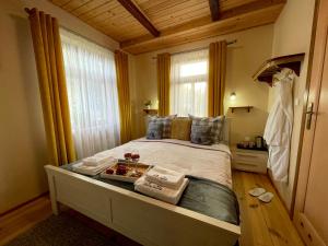 Łóżko lub łóżka w pokoju w obiekcie Dolina Sarenek