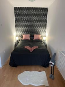 Posteľ alebo postele v izbe v ubytovaní Belvárosi apartman