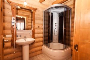 a bathroom with a shower and a sink at М House in Vorokhta +95 photos