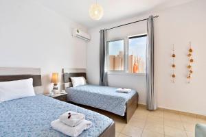 Posteľ alebo postele v izbe v ubytovaní Villa Renata Gold