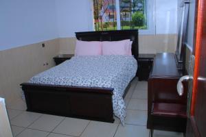 Un ou plusieurs lits dans un hébergement de l'établissement Appartement à 100m de la plage