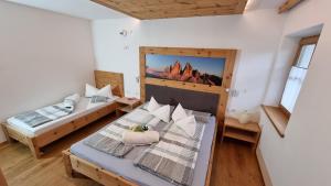 Una cama o camas en una habitación de Apartment Himmelreichhof