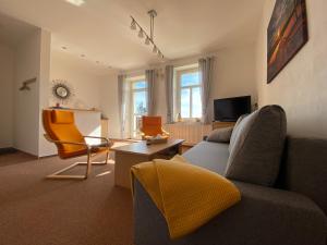 Posedenie v ubytovaní Apartmány nad Šlikovkou