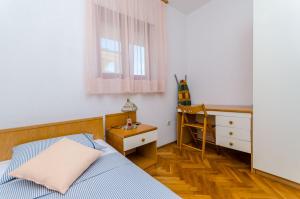 Posteľ alebo postele v izbe v ubytovaní Apartments Jurko