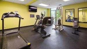 a gym with several exercise bikes in a room at Best Western Plus Birmingham Inn & Suites in Birmingham