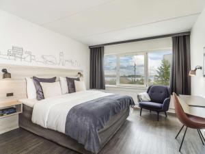 Postel nebo postele na pokoji v ubytování Radisson Blu Limfjord Hotel, Aalborg + 37 fotografií