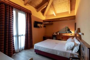 Letto o letti in una camera di La Villa - Sure Hotel Collection by Best Western