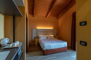 Letto o letti in una camera di La Villa - Sure Hotel Collection by Best Western