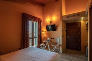 TV o dispositivi per l'intrattenimento presso La Villa - Sure Hotel Collection by Best Western