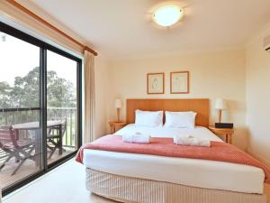 Posteľ alebo postele v izbe v ubytovaní Villa 2br Prosecco Villa located within Cypress Lakes Resort
