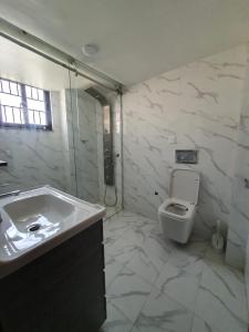 Een badkamer bij Grace - Residential home
