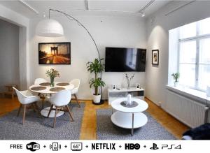 TV a/nebo společenská místnost v ubytování Central Aleksanteri