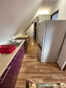 A cozinha ou cozinha compacta de Pokoje i apartamenty Aga Centrum