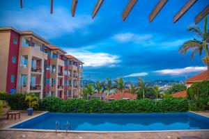 a view of the apartment buildings and a swimming pool at Bon Bini Residence in Kampala