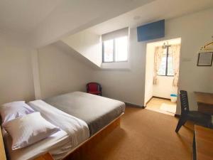 Katil atau katil-katil dalam bilik di Hillview Inn Cameron Highlands PROMO