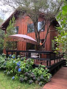 Zahrada ubytování Cabañas Natural Park Lodge Pucón