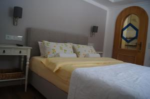 Rúm í herbergi á Land - Haus