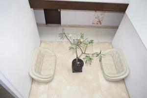 Posezení v ubytování The Hamuse Hotel Kodaikanal - Luxury Redefined