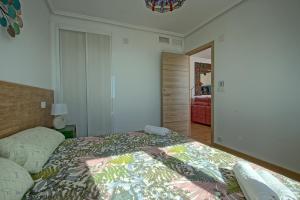 Łóżko lub łóżka w pokoju w obiekcie 055 - Gran Playa Views - comfortHOLIDAYS