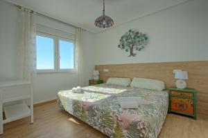 Łóżko lub łóżka w pokoju w obiekcie 055 - Gran Playa Views - comfortHOLIDAYS