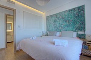Łóżko lub łóżka w pokoju w obiekcie 055 - Gran Playa Views - comfortHOLIDAYS