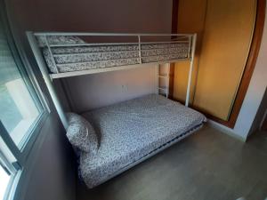 an empty bunk bed in a room with a window at La Union in Cuevas del Almanzora +47 photos