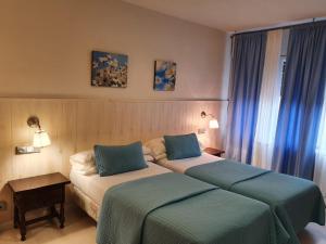 Postel nebo postele na pokoji v ubytování Hotel Las Truchas + 37 fotografií