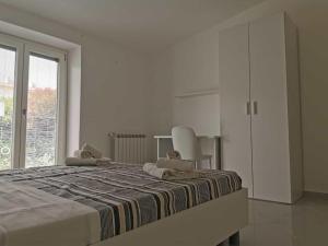 A bed or beds in a room at VILLA LUDO a ZAMBRONE TROPEA