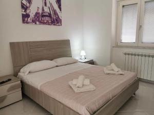 A bed or beds in a room at VILLA LUDO a ZAMBRONE TROPEA