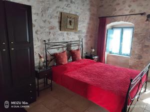 Posteľ alebo postele v izbe v ubytovaní Petrounis Hotel