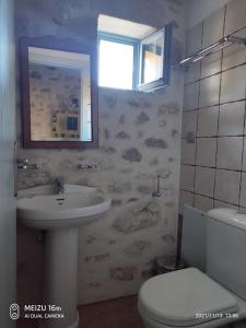 Kúpeľňa v ubytovaní Petrounis Hotel