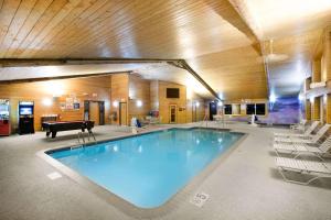 The swimming pool at or near AmericInn by Wyndham Pequot Lakes