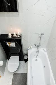 Ванная комната в Cracovia Wawel Apartments