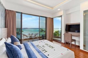 Letto o letti in una camera di Arena Beach Hotel