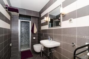 Kúpeľňa v ubytovaní Apartments Gaura