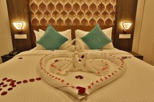 מיטה או מיטות בחדר ב-Hotel Ramtel inn