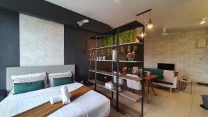 Ένα ή περισσότερα κρεβάτια σε δωμάτιο στο Cosy Home@Midhills Genting Highland (Free Wi-Fi) +40 φωτογραφίες