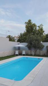 Πισίνα στο ή κοντά στο Casa grande con piscina