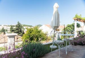Vonkajšia záhrada v ubytovaní Apartments Gaura