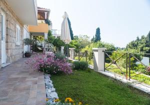 Vonkajšia záhrada v ubytovaní Apartments Gaura