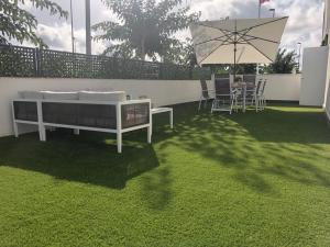 Vonkajšia záhrada v ubytovaní Appartement Casa-M in Torre de la Horadada