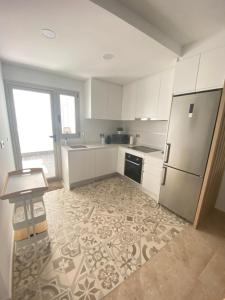 Kuchyňa alebo kuchynka v ubytovaní Appartement Casa-M in Torre de la Horadada